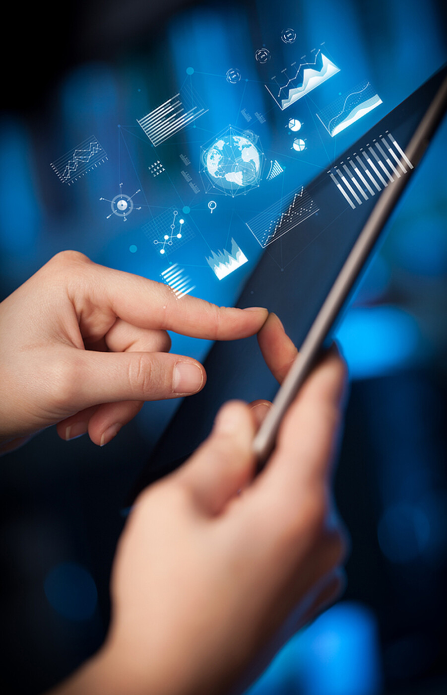 Hand holding tablet with global business concept.