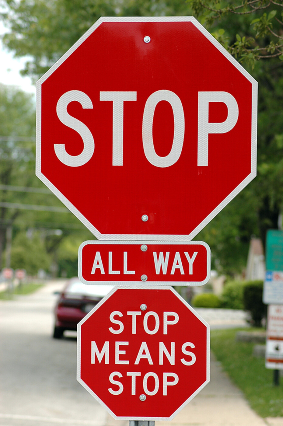 stop sign with multiple signs including one that says stop means stop.