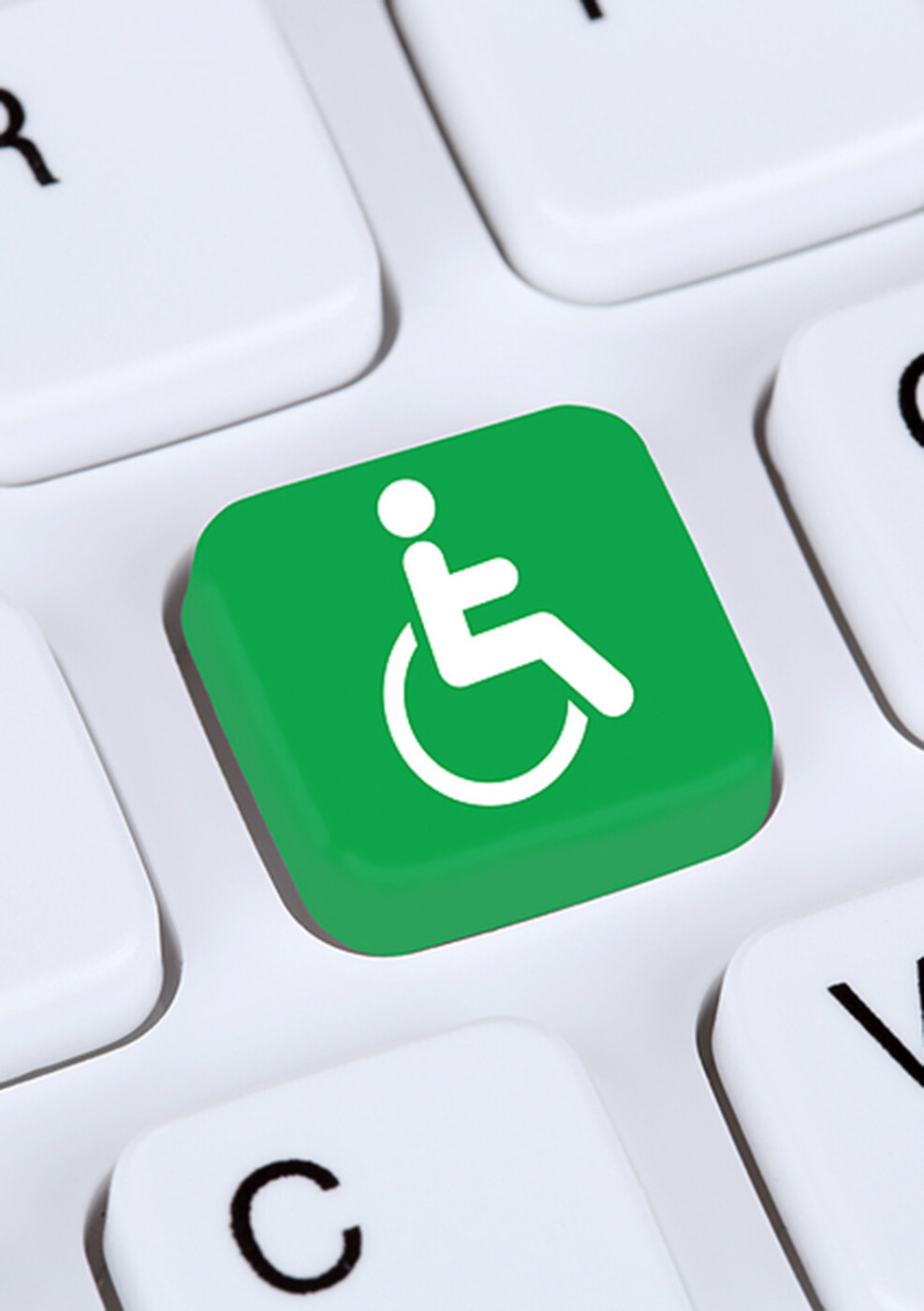 a handicap sign on a keyboard button.